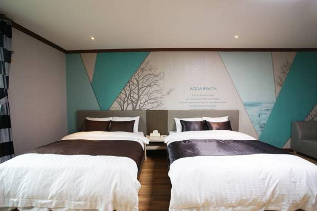 Seongsan Aqua Beach Hotel Szogüpho Szoba fotó