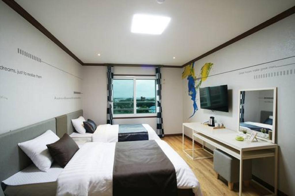 Seongsan Aqua Beach Hotel Szogüpho Szoba fotó