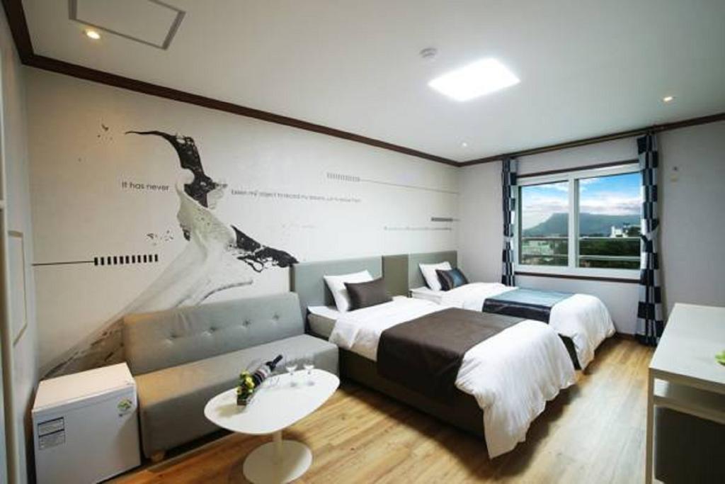 Seongsan Aqua Beach Hotel Szogüpho Szoba fotó